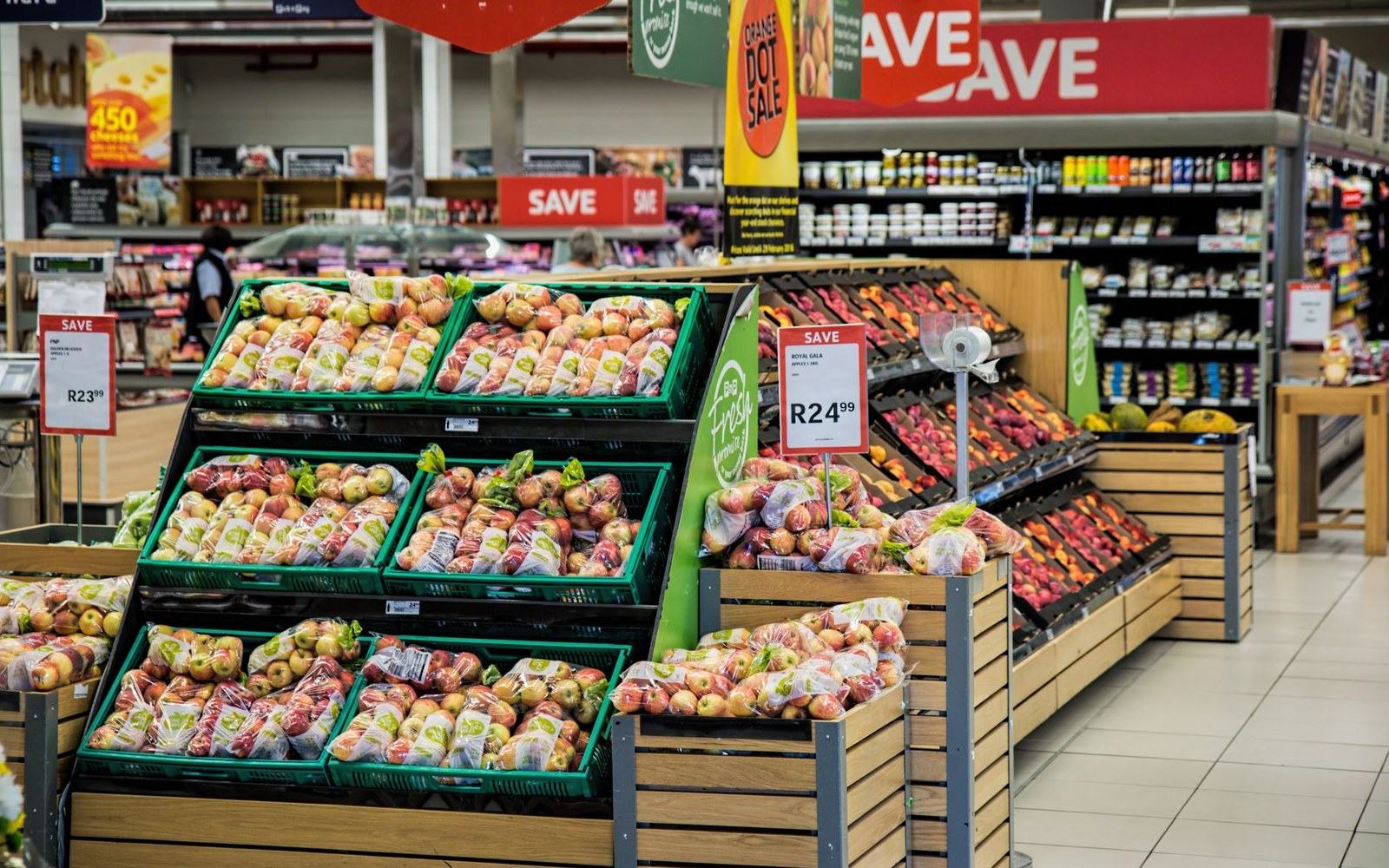 An aisle end-cap stacked high under a promotional header
