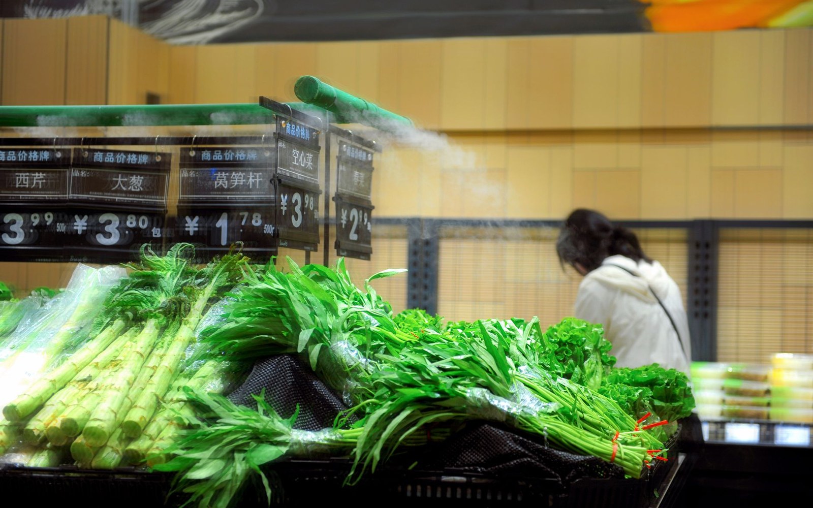 Produce banked at a shop entrance